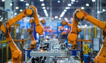 Factory automation with robotic packaging systems improving production speed, accuracy, and efficiency